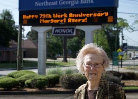 Northeast Georgia Bank celebrated the 79th work anniversary of Margaret Ayers May 10. The bank presented Ayers with a cake and posted a special message on its bank sign. (Photos by Raese)