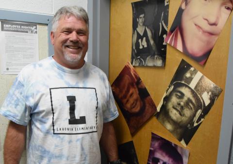 The faculty at Lavonia Elementary School decorated the office door of retiring Principal Brad Roberts with photos from his past. (Photo by Scoggins)