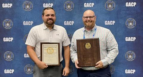 Lt. Wayne Mitchum (left) and Deputy Chief Daniel Carson (right) received the Lavonia Police Department’s State Certification recently during the Georgia Association of Chiefs of Police Summer Conference in Savannah. 