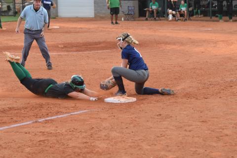 Franklin County’s Karson Johnson beats the tag with a slide into third base Tuesday in the Lady Lions’ home opener against Elbert County. (Photos by Scoggins)