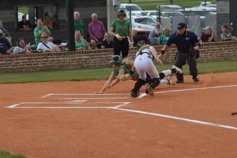 Lenox Roberts is tagged out while flying toward home plate against Hart County Thursday in Hartwell. (Photo by Scoggins)