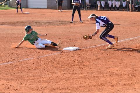 Lady Lion Josie Burton slides safely into third during the Region 8AAA opener against Monroe Area Thursday. (Photos by Scoggins)
