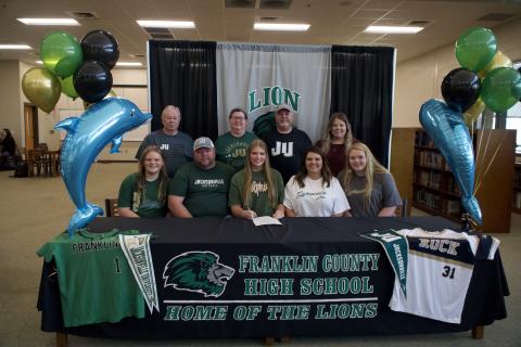 Karson Johnson signed Nov. 8 to play collegiate softball for the Jacksonville University Dolphins.