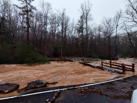 A huge storm system dropped about five inches of rain in about 12 hours on Franklin County Tuesday, swelling creeks and rivers out of their banks, flooding driveways and, along with gusty winds, felling trees.