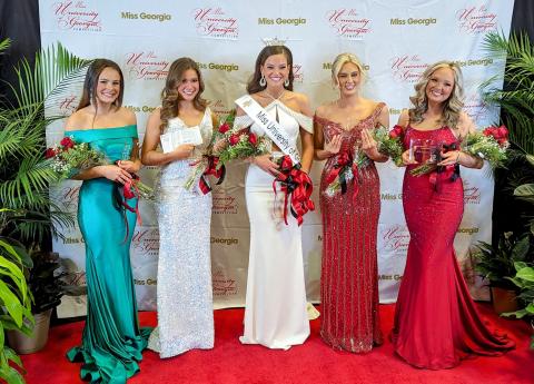 Franklin County native Carson Bridges (center) poses with her court after winning the Miss University of Georgia pageant. (Photos courtesy of the Miss UGA Competition)