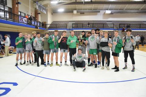 The Franklin County Lion wrestling team celebrates back-to-back Area 8AAA Duals championships after winning the 2024 title Saturday at Oconee County. The team will wrestle in the state tournament Jan. 19-20.