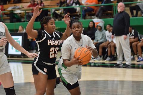 Emiyah Strange drives past a Hart defeander and looks for a shot in the Lady Lion’s final home game of the regular season Friday. (Photos by Scoggins)