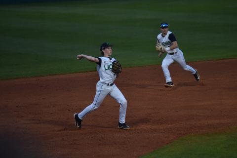 Luke Beasley makes a throw from third in action earlier this season.