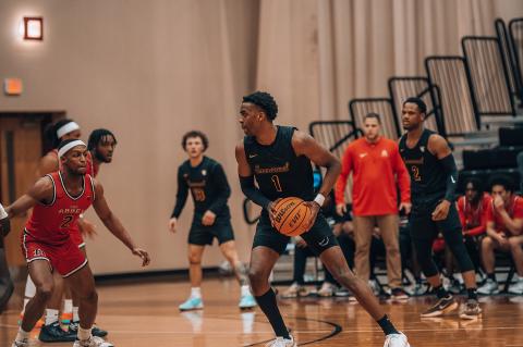 K.J. Jones’ name will be in the Emmanuel University basketball record book for a long time, but Jones will also graduate magna cum laude with a business degree. (Photos courtesy of Emmanuel University)