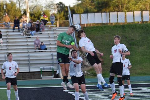 Lion Max Bridges goes up for a header during action Friday at Jeff Davis Field at Ed Bryant Stadium in a win over Stephens County to clinch a state playoff spot. (Photo by Scoggins)