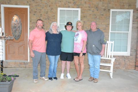 Donors Dusty Morgan and Karen Colwell stand with kidney recipient Mason Kelley and parents Tammy and Brian. (Photo by Eavenson)