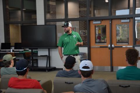 New Head Baseball Coach Ryan Phillips addresses the team after being introduced Thursday by Athletic Director Clay Moore. (Photo by Scoggins)