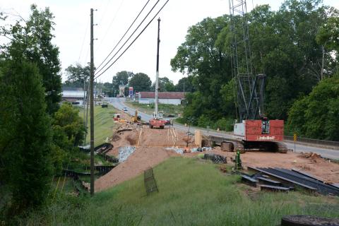 Work is under way on a bridge replacement on Highway 59 in the middle of Carnesville. (Photo by Eavenson)