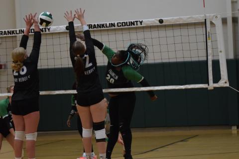Senior TaKiyah Merriett spikes a ball against Fannin County in the Lady Lions’ season opener Friday at Rocky Ford Park. (Photos by Scoggins)