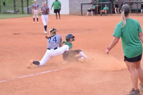 Macy Moore slides safely into third base Monday in a win over Elbert in Carnesville. (Photo by Scoggins)