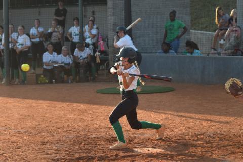 Josie Burton (above) prepares to swing in a Region 8AA victory over East Jackson Tuesday in Carnesville. 