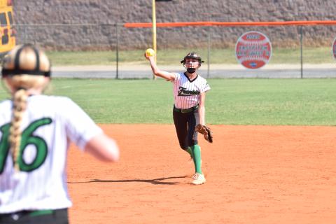 Shortstop Piper Crump throws to first baseman Brailey Randall (above photo) for an out in the Rabun game.
