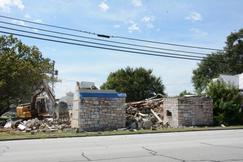 LAVONIA – A contractor for the City of Lavonia demolished the city-owned Ford Theatre building on Vickery Street Tuesday. Most recently, the old rock building had housed Lavonia Masonic Lodge No. 241. Mayor Courtney Umbehant said that plans are under way to expand the Downtown Weldon Park where the gazebo is located. (Photo by Eavenson)