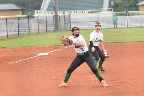 Pitcher McCall Davis prepares to make a throw to first in a game earlier this season. Davis struck out 11 Tuesday in a 6-1 win over Hebron Christian in Dacula.
