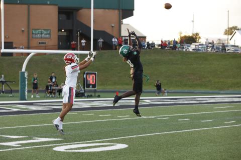 Jeremiah Mayfield (top photo) leaps to defend a pass during Monday’s game against Stephens County in Carnesville. (Photo courtesy of Rachel Howington Photography)