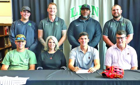 Franklin County Lion senior Ty Peeples signed Friday to play for the Georgia Bulldogs’ baseball team next year. Pictured at his signing are (front, from left) brother A.J. Peeples, mom Kim Peeples, Ty, dad Tod Peeples, (back) Lion baseball coaches Duncan Beasley, Drew Phillip, Demond Rivers and head coach Ryan Phillips.
