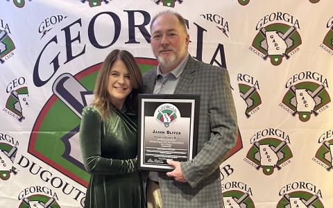 Jason Oliver (with wife Candace) was inducted to the Georgia Dugout Club’s Softball Hall of Fame Saturday at a ceremony at the Renaissance Waverly Hotel in Atlanta.