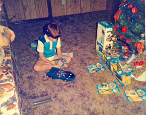 Courtney Umbehant with his League of Justice on his favorite Christmas to remember.