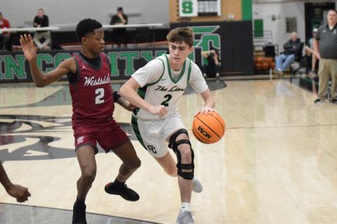 Chandler Coulter drives toward the basket in action earlier this season.