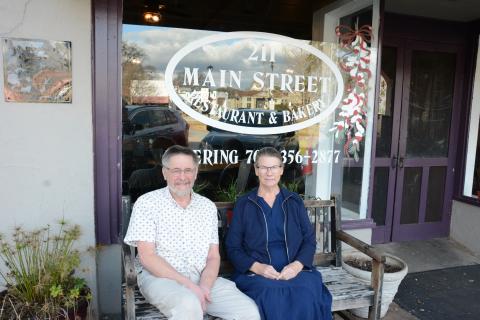 211 Main Street Restaurant founders Bob and Trish Toews have sold the cornerstone business in downtown Lavonia to Top Dawg Grillers owners Chris and Kim Rice. (Photo by Eavenson)