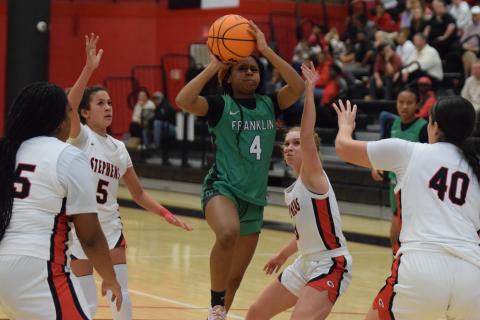 Nykhia Johnson puts up a shot against Stephens County Tuesday in Toccoa. Johnson finished with 20 points to lead the Franklin County Lady Lions.