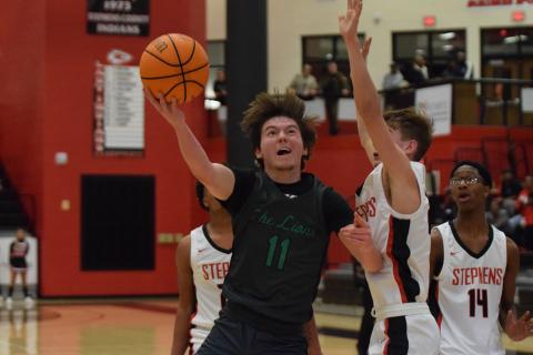 Bentley Huff (above) puts up a shot Tuesday against Stephens County.