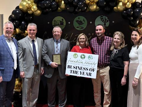 Emmanuel University was honored with the Franklin County Chamber of Commerce’s Bruce Knighton Award for Business of the Year during the annual Gala and Awards Banquet last week at the Swails Center. Pictured are Brian James, Matt McRee and President Greg Hearn of Emmanuel University, Chamber President Cyndee Phillips and Knighton family members Susan, Lacey and Vic. (Photos by Scoggins)