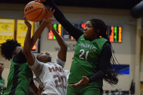 Lady Lion Roniyah Johnson blocks a Hart County shot during the Region 8AA semifinals last week at Emmanuel University. (Photo by Scoggins)