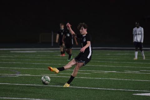 Midfielder Reese Fowler takes a free kick in a game earlier this season for the Franklin County Lions.