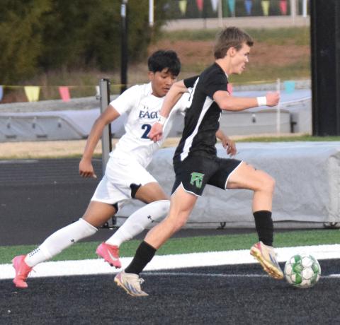 Eli Cooling drives toward the net before scoring a goal Tuesday in a victory over East Jackson in Carnesville. (Photos by Scoggins)