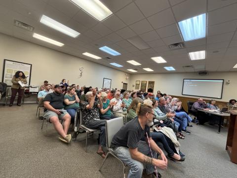 An estimated 220 people came to the Franklin County Board of Commissioners meeting Monday at the Franklin County Justice Center. Seating in the meeting room were full and people stood in the hallway and the parking lot. (Photo by Scoggins)