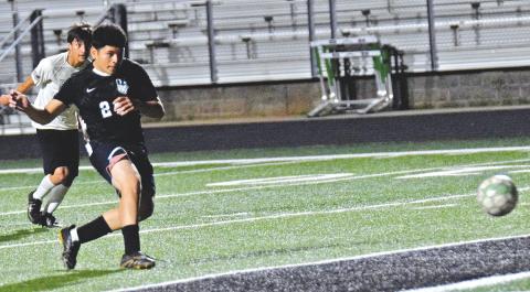 Senior Lion Christian Guerrero sends a penalty kick into the net for one of Franklin County’s goals in a 4-2 win over Hart County Friday night at Jeff Davis Field at Ed Bryant Stadium. Franklin’s win over Hart County, combined with a Hart loss Tuesday to Hebron Christian, means Franklin will finish second in the region and host a state playoff game for the first time ever. (Photos by Scoggins)