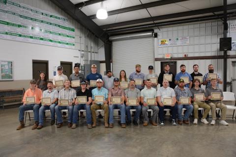 New firefighters graduating (above) from Firefighter 1 training Thursday at the Franklin County High School Ag Building are (seated, from left): Connor Anderson, Jeremey Barnes, Landon Bentley, Hunter Bruce, Landon Bruce, Preston Chandler, Joe Cheek, Brandon Coleman, Dennis Dailey, Mark Edwards, Landon Floyd, Rhett Floyd, (second row) Katie Free, Caden Jordan, Rusty King, Elijah London, James Roberts, Kayla Rogers, Ben Roper, Mallory Segars, Sam Segars, Parker Sosby, T.J. Sosby and Chris Williamson. Not pic