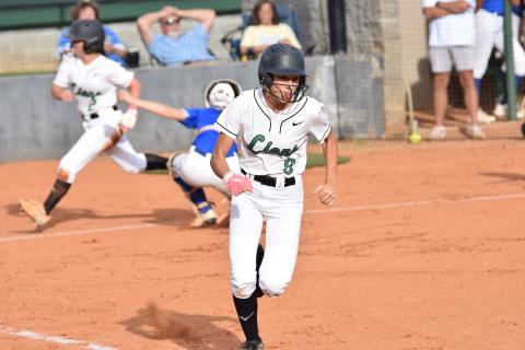 Rylee Gibson runs to first after a bunt as Hannah Horne scores behind her in Franklin’s 12-0 victory over Lake Oconee Academy Monday in Carnesville. (Photos by Shane Scoggins)