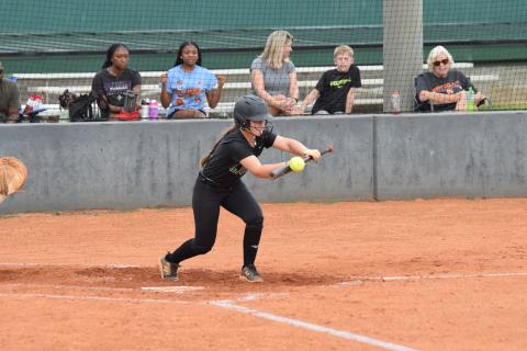 Ella Kinder lays down a bunt in a Franklin Fastpitch game against Hart County Thursday in Carnesville. (Photo by Shane Scoggins)
