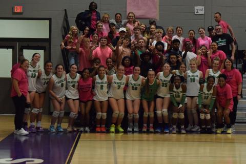 The Franklin County Lady Lions volleyball team celebrate with the Rude Crew after sweeping Stephens County in the first round of the Region 8AA tournament Tuesday at South Franklin Elementary School. The win secured a state playoff berth for FCHS for the first time in school history. (Photo by Shane Scoggins)