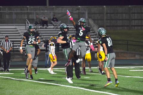 Gavin Wells celebrates after recovering a fumble on a punt for the Franklin County Lions against Prince Avenue. (Photo by Shane Scoggins)