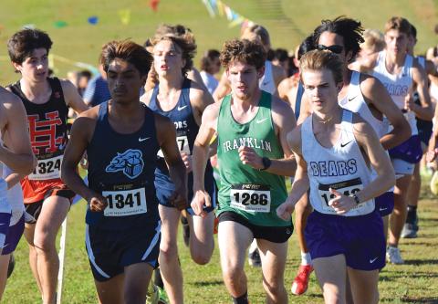 Lion Will Gipson was caught in the field to start Thursday’s race in the Jan Taylor Invitational, but eventually found his way to the front and a victory in the race. (Photos by Shane Scoggins)