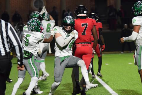 Senior Ramsey Fulbright celebrates after knocking a Callaway blocker into a ballcarrier to cause a safety during Friday’s first round playoff game in LaGrange.