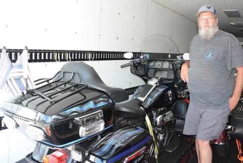 Richard Roberts, pictured with the motorcycle he rode as a Patriot Guard Rider, will be honored Saturday with the Ride for Richard.