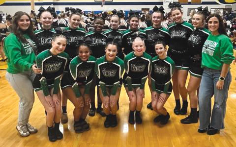 Members of the Franklin County High School Competition Cheer team are (front, from left) Carolina Madden, Livie Roach, Jaidan Silva, Ava Smith, Hadley Floyd, (back) Coach Caitlin Esco, Ciara Williams, Montana Chastain, Heaven LaBoon, Amelia Bennett, Layla Rosales, Hayden Carroll, Kenzie Adams and Coach Courtney Coleman. The team finished 11th in the state sectional Saturday in Cordele and will compete in the state meet Friday at the Macon Coliseum. (Photo courtesy of Courtney Coleman)
