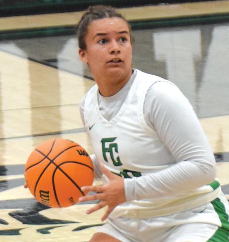 Lady Lion Kallie Thrift looks to make a pass in a game earlier this season.