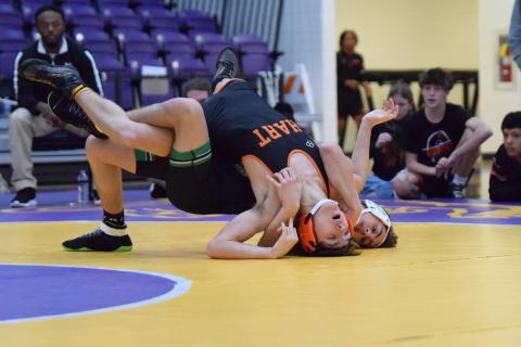 Lion Trey Silva stretches out a Hart County opponent in the Area 8AA Duals Championship round Saturday in Blairsville. (Photo by Shane Scoggins)