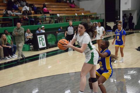 Avery Burton grabs a rebound in a Lady Lions win over Washington-Wilkes Wednesday in the Lions' Den.