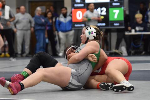Lady Lion Hannah Crowe avenged a third place finish in her area tournament by defeating the area champion and the wrestler that defeated her at area to win the State Sectional tournament Friday in Commerce. (Photos by Shane Scoggins)